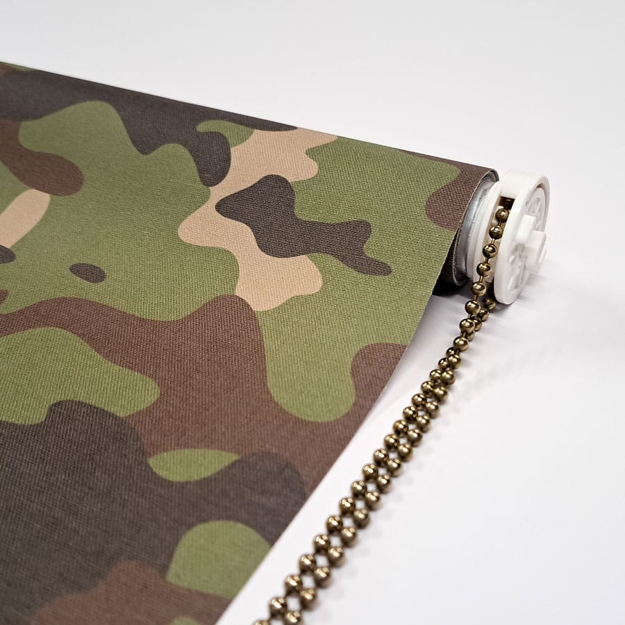 close-up of camouflage roller blind mechanism with chrome chain