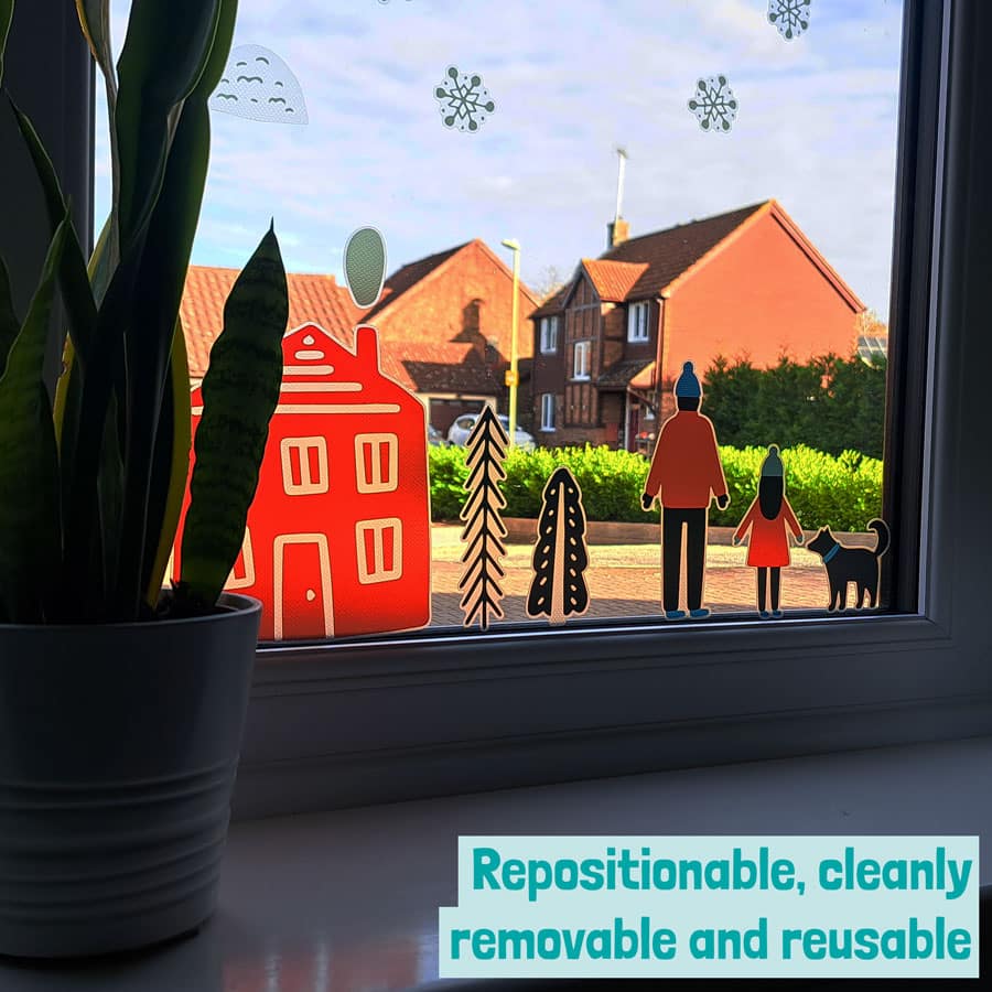 scandi christmas window stickers on the window with label showing repositionable, removable and reusable of window stickers