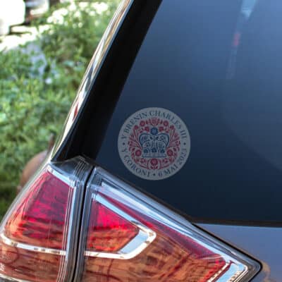official coronation logo window sticker on the inside of a car windwow