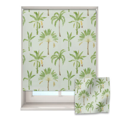 banana trees roller blind on a window with a fabric swatch in front