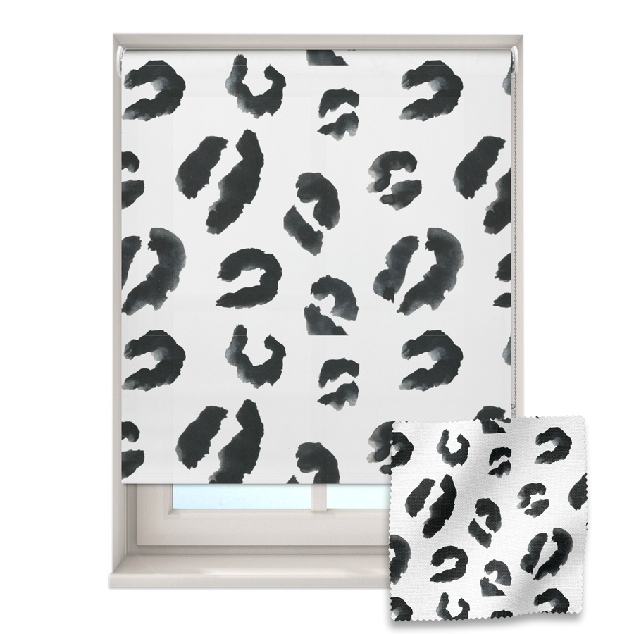 leopard print roller blind on a window with a fabric swatch in front