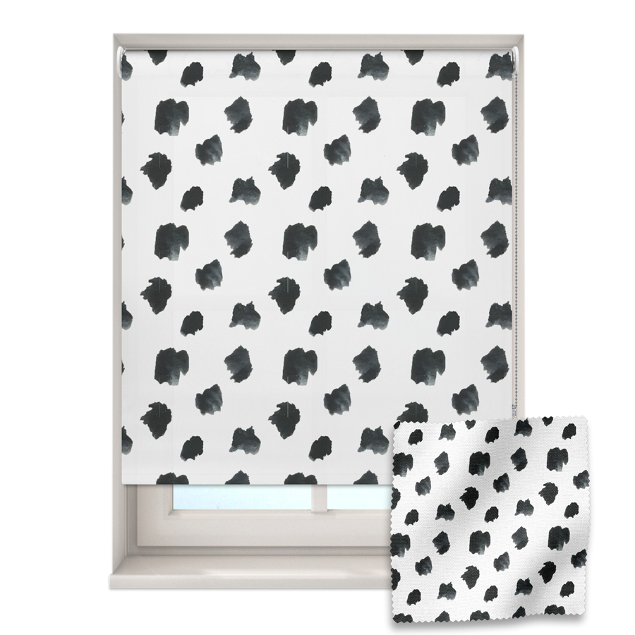 dalmatian print roller blind on a window with a fabric swatch in front