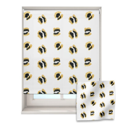 cheetah print roller blind on a window with a fabric swatch in front