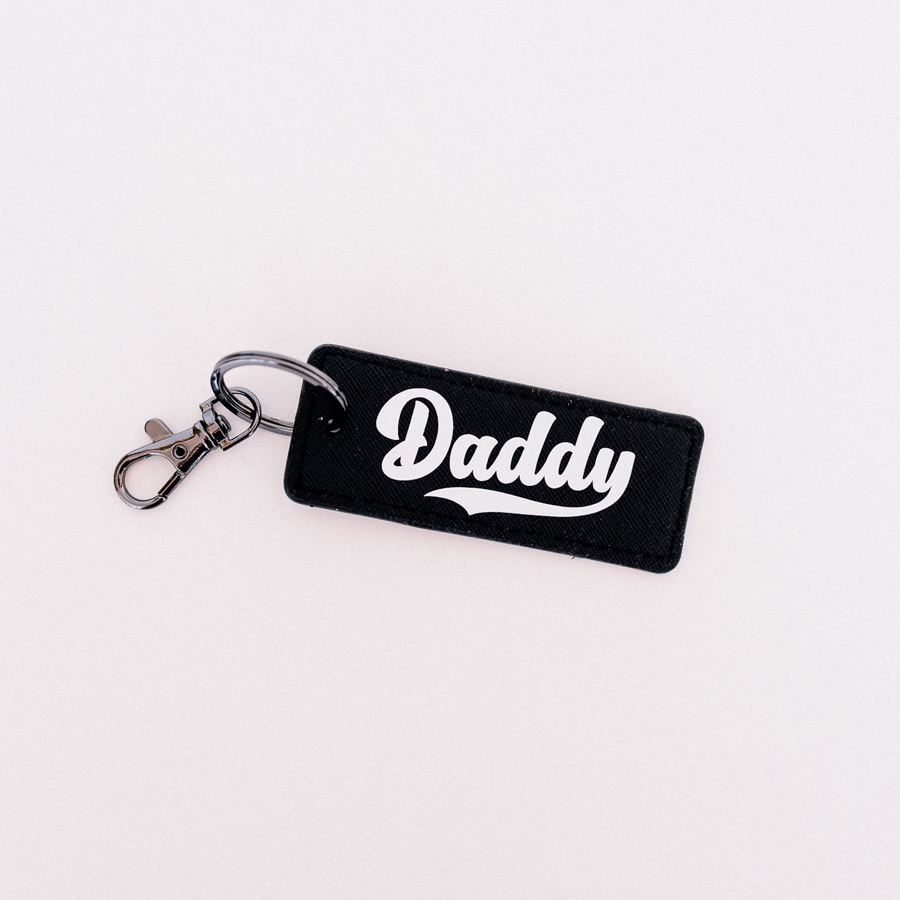 Dad est keyring, Daddy personalisation in black black with white text