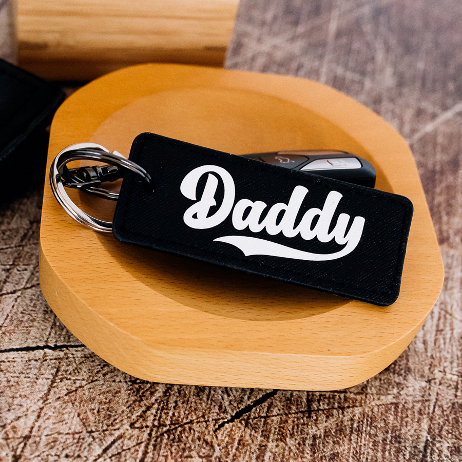 Dad est keyring, Daddy personalisation in black black with white text