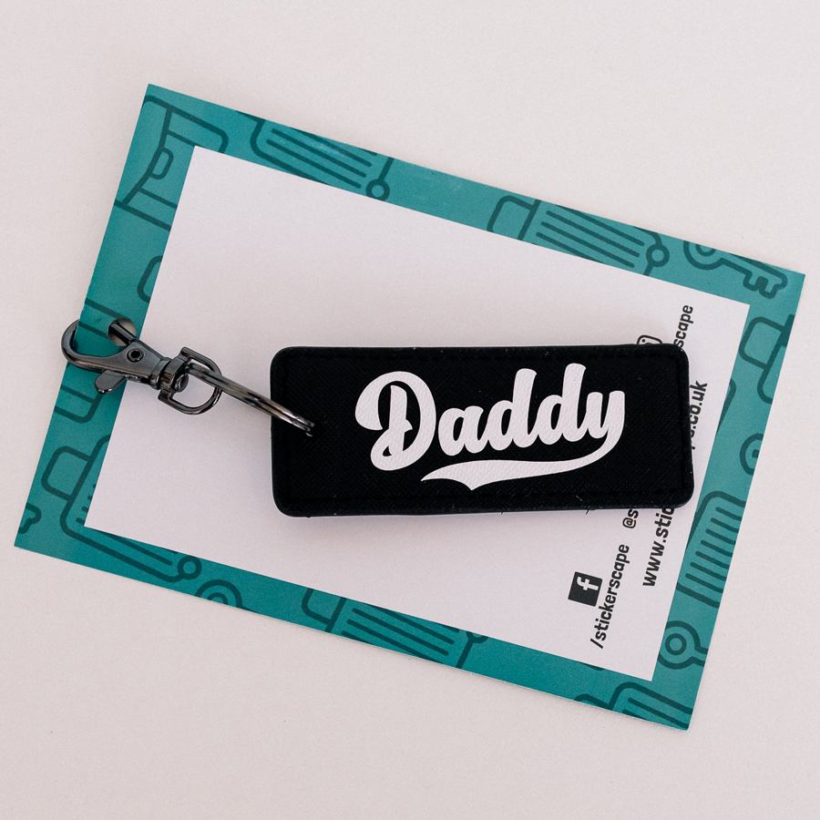 Dad est keyring, Daddy personalisation in black black with white text