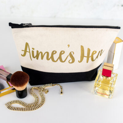personalised hen wash bag in black with gold text