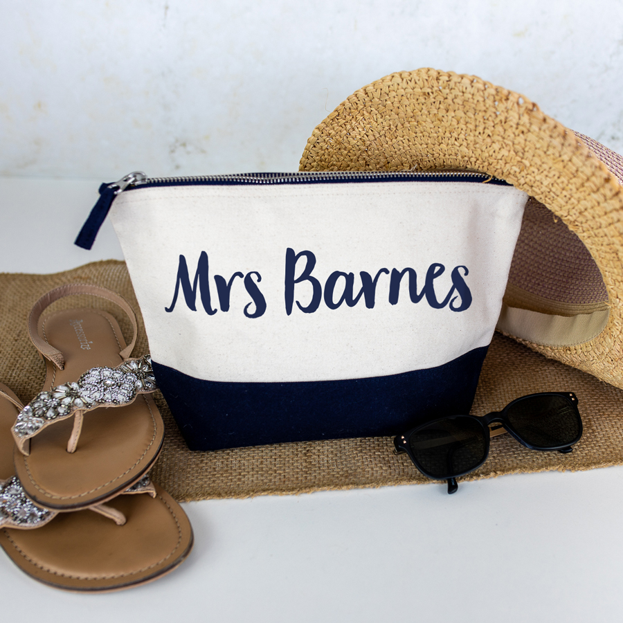 personalised last name wash bag in navy with navy text