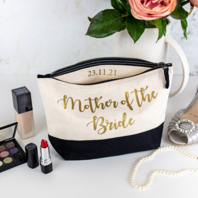 bridal party wash bag in black with gold text