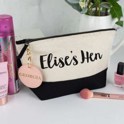 hen do bundle, black wash bag with black text, pink keyring with a gold foil name on the keyring