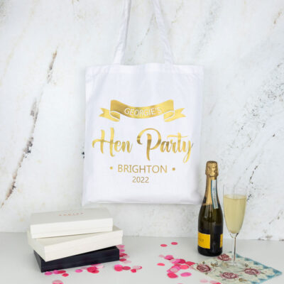 Hen party tote bag in white with gold text