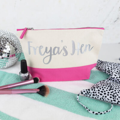 personalised hen wash bag in pink with silver text