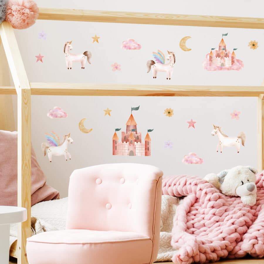 watercolour unicorn stickaround pack, stickers shown on a white wall above a bed in a young child's bedroom