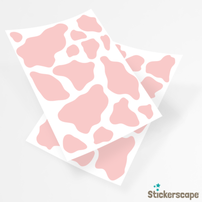 cow print wall sticker pack in pink shown on the sheets