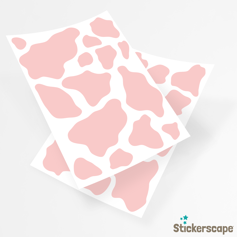 cow print wall sticker pack in pink shown on the sheets
