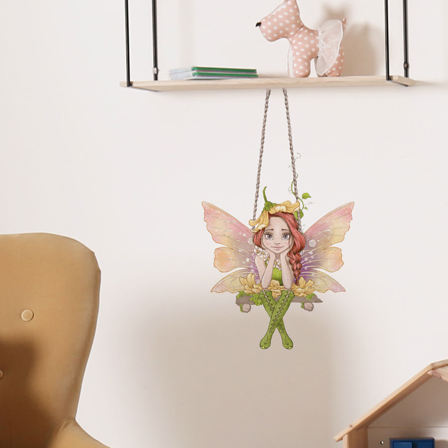 fairy swing wall sticker shown on a light coloured wall