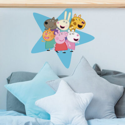 Peppa & friends star wall sticker shown on a light blue wall behind a set of star pillows