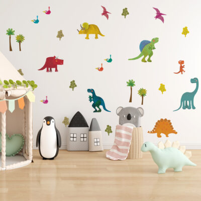 friendly dinosaurs wall sticker pack shown on white wall behind soft toys