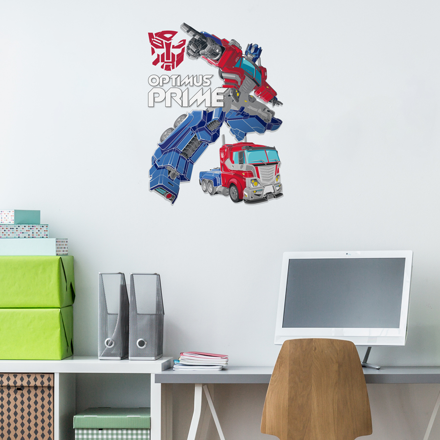 Transformers Wall Stickers option 1 Optimus Prime shown on a white wall behind a white desk with a wooden chair