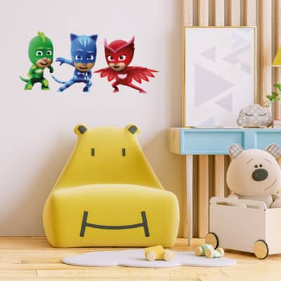 PJ masks team wall sticker regular shown on a light cream wall behind a yellow chair