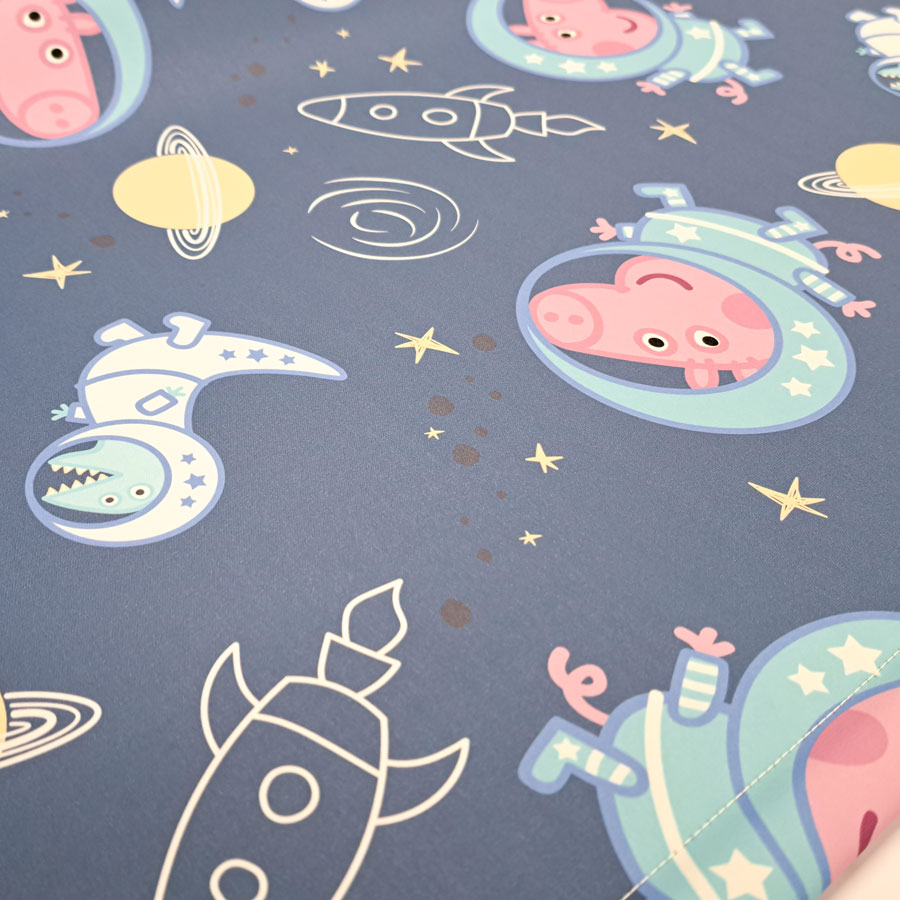 George in Space roller blind close up of pattern with George in space suit on a dark blue background with white rockets