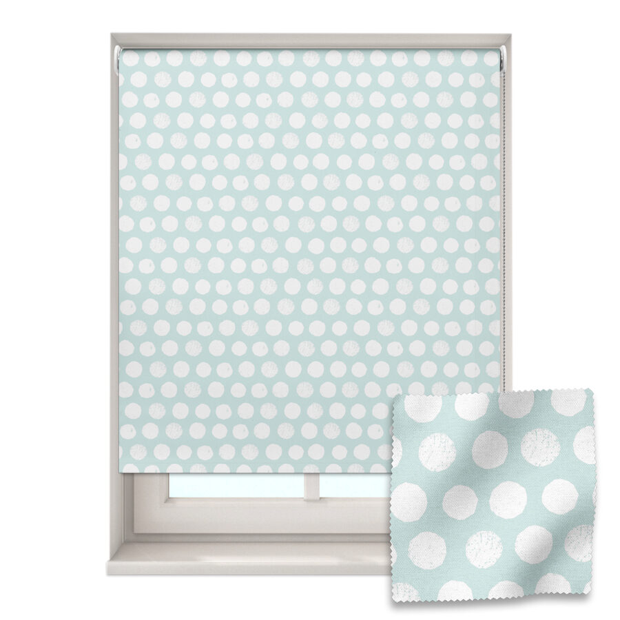 Blue spot roller blind shown on a window