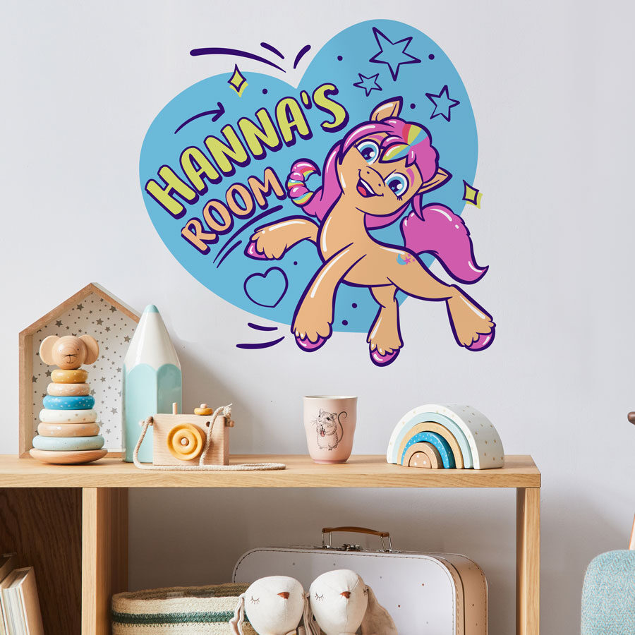 Personalised Sunny wall sticker option 1 regular shown on a white wall above a light coloured wooden table