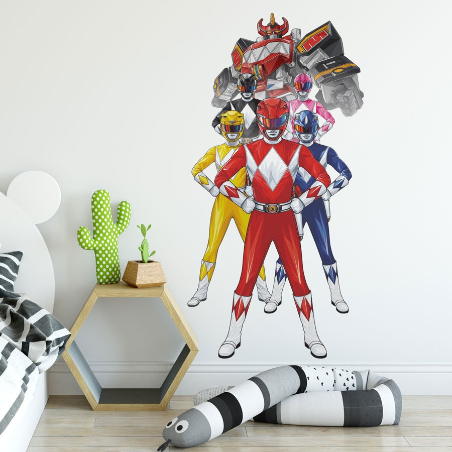 Power Rangers group wall sticker large shown on a white wall behind a wooden bedside table and white bed frame