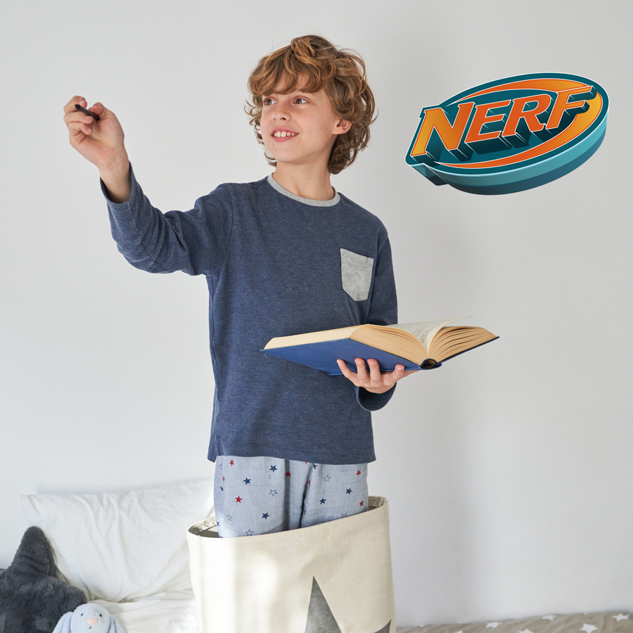 3D Nerf logo wall sticker regular shown on a white wall behind a young teenager with a book