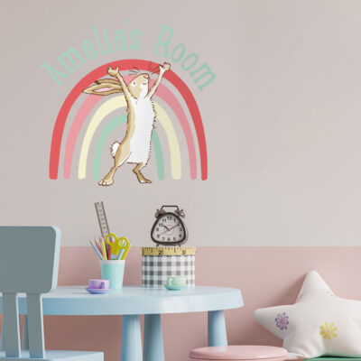 Personalised rainbow hare wall sticker regular mint shown on a white and pink wall above a light blue table and char