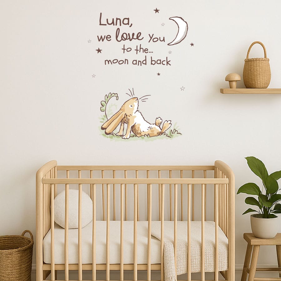 personalised Guess How Much I Love You wall sticker on a baby nursery wall