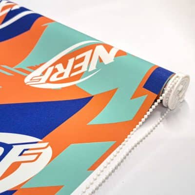 close-up of Orange Nerf roller blind showing chain mechanism with white chain