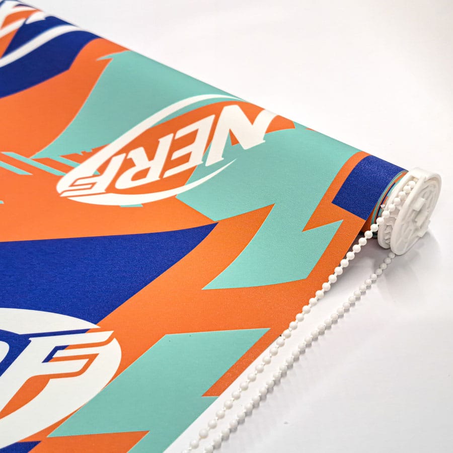 close-up of Orange Nerf roller blind showing chain mechanism with white chain