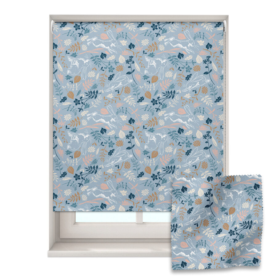 blue woodland mix roller blind shown on a window with a zoom in of the material and pattern on the bottom right