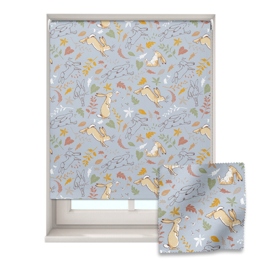 blue colourful hares roller blind shown on a window with a zoom in of the material and pattern on the bottom right