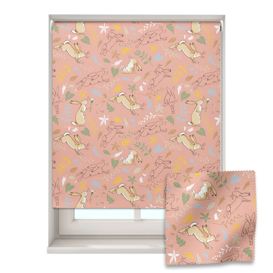 pink colourful hares roller blind shown on a window with a zoom in of the material and pattern on the bottom right