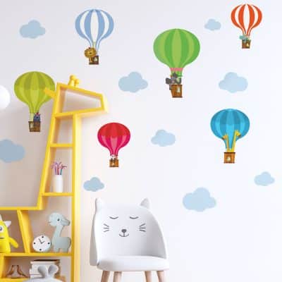 hot air balloon wall sticker pack on a child's bedroom wall with colourful balloons and clouds