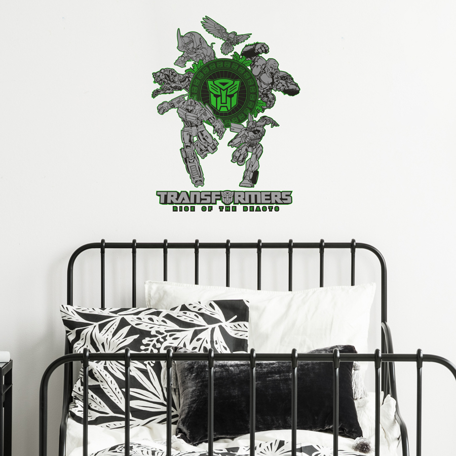 Rise of the Beasts wall sticker shown on a white wall above a bed.