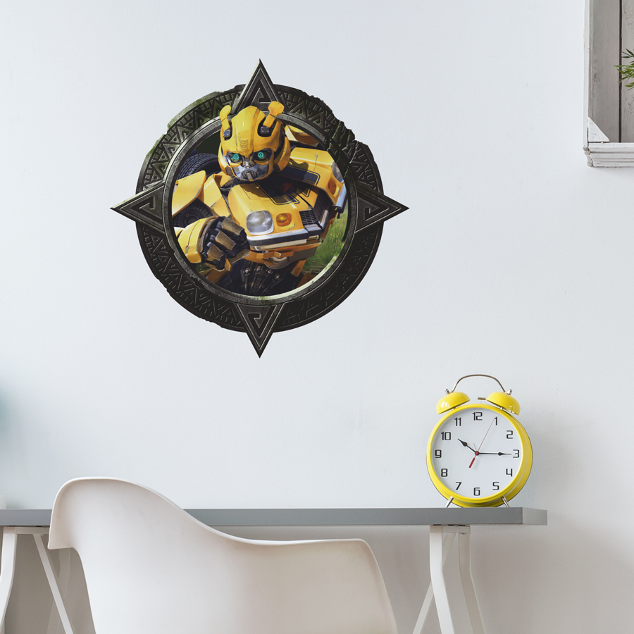 Bumblebee wall sticker shown on a white wall above a desk.