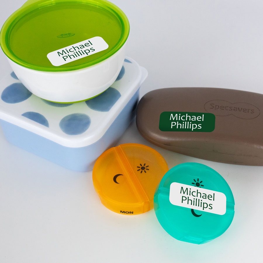 Green name labels on tupperware
