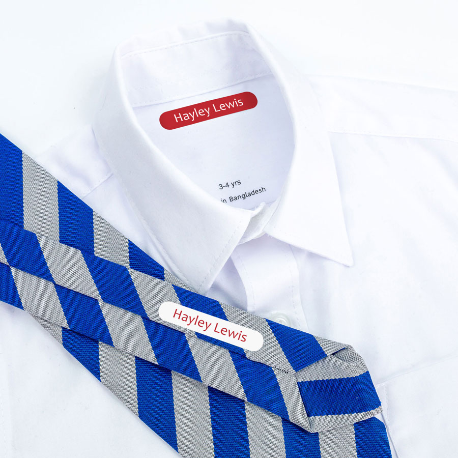 Red name labels on school tie and uniform
