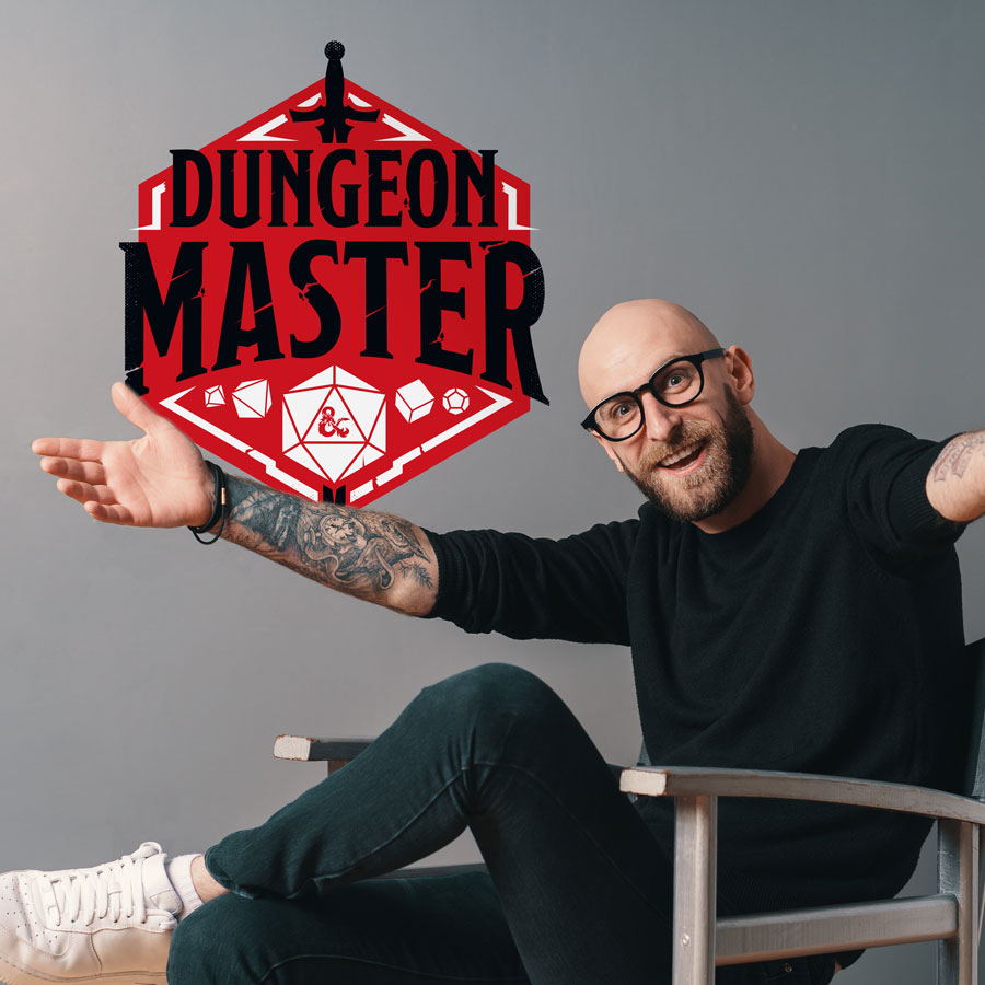 D&D Dungeon Master wall sticker shown on a grey wall behind a man.