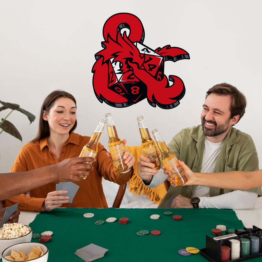 D&D Dice and Ampersand wall sticker shown on a light wall above a group of people playing games.