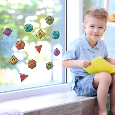 D&D Dice Window Stickers on window behind boy