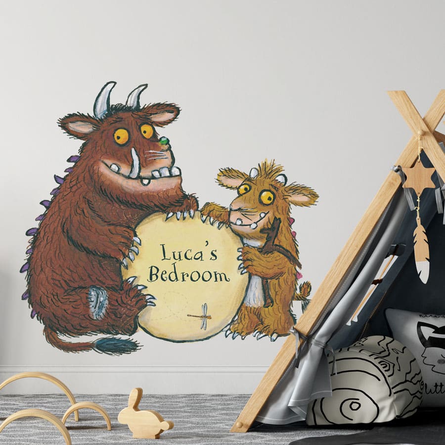personalised gruffalo and child wall sticker on a bedroom wall