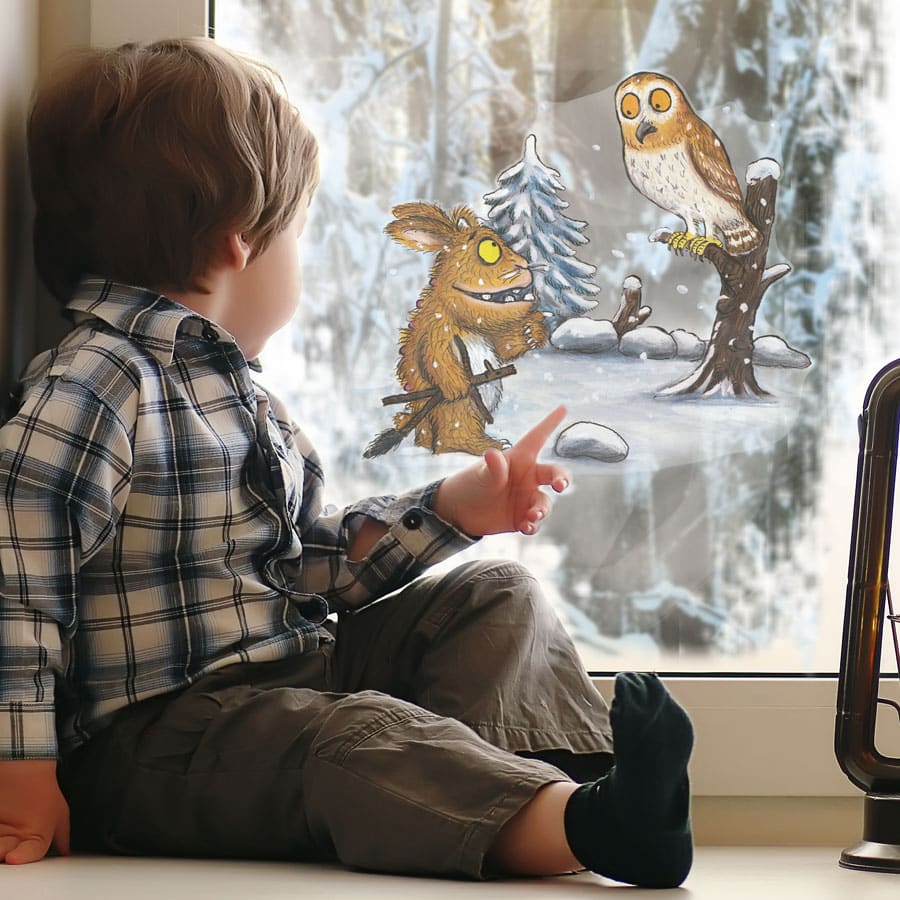 Gruffalo's Child and Owl Window Sticker on a window with a child