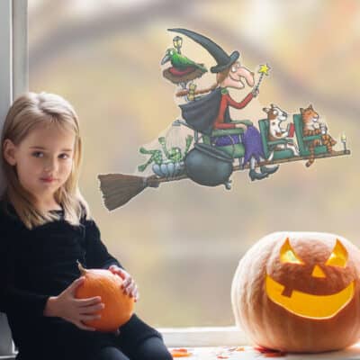 room on the broom busy broom window sticker on a window with pumpkin