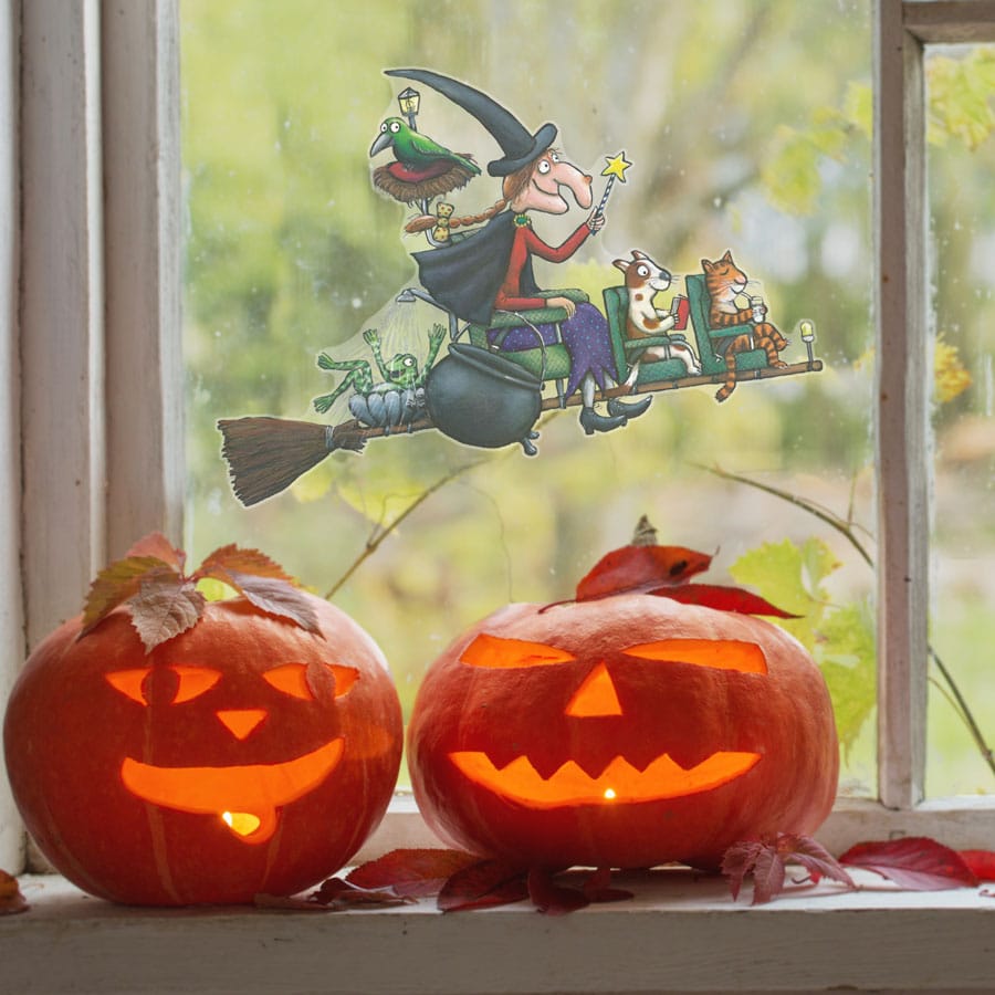 room on the broom busy broom window sticker on a window with pumpkin