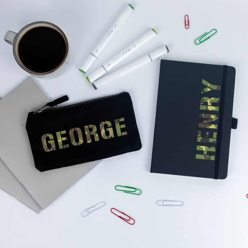Camouflage themed pencil case and notebook in black