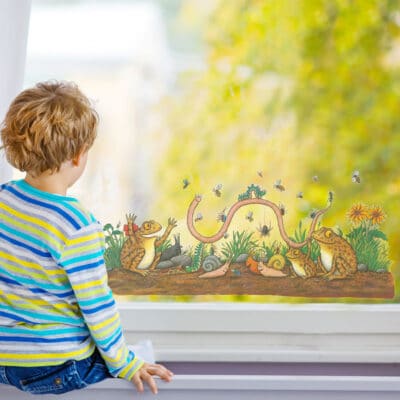 Superworm Garden Scene window sticker on a boy's bedroom window
